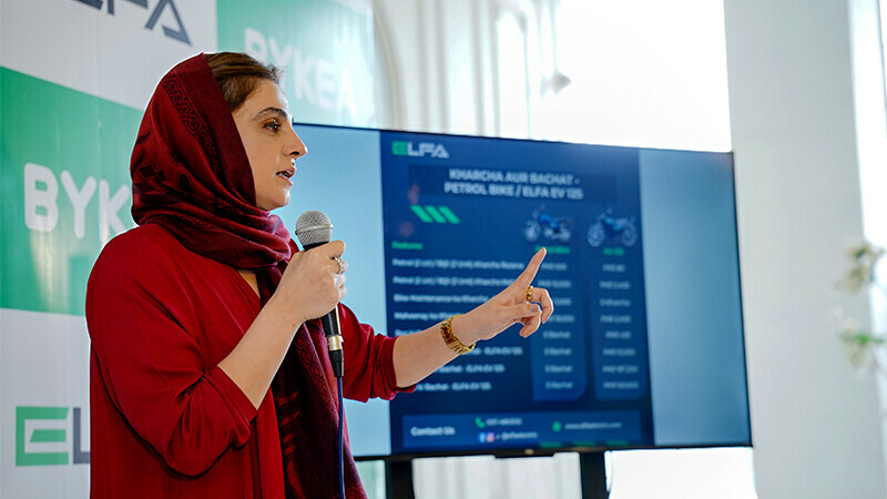 EV Technologies CEO Huma Yahya Khattak briefing Bykea driving-partners about ELFA electric bikes.