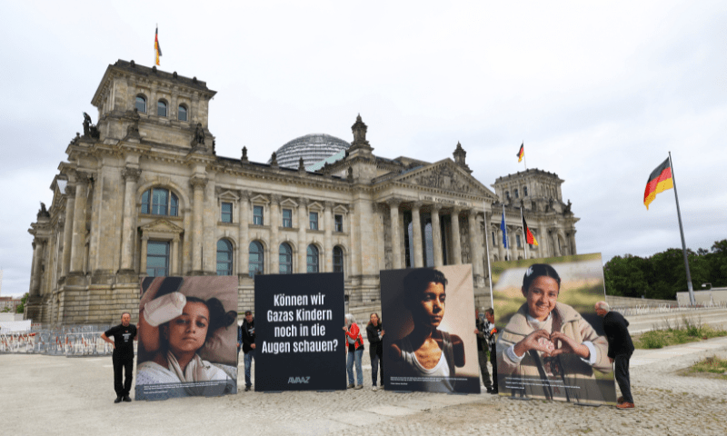  People attend a protest showing pictures of children from Gaza in front of the Reichstag building, calling for more commitment of the German government to the children of Gaza and the defence of international law, in Berlin, Germany on July 9, 2025. &mdash; Reuters 