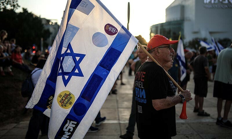 Israelis protest in support of the release of all hostages who were kidnapped from Israel to Gaza when Hamas attacked Israel on October 7, 2023,  and against the Israeli government in Tel Aviv, Israel on July 12. &mdash; Reuters