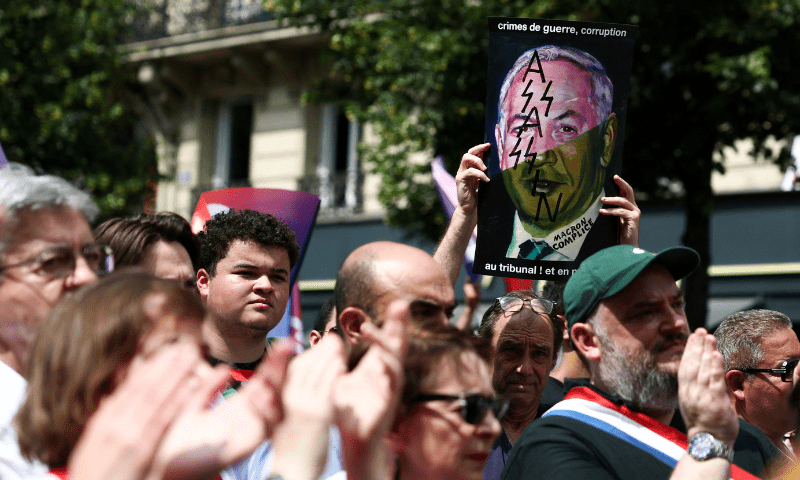  A man holding a placard attends a demonstration organised by several French labour unions and French left-wing political parties in support of Palestinians in Gaza, calling for an immediate ceasefire in Gaza and for unhindered access for humanitarian aid at the Place de la Republique in Paris, France on June 14, 2025. — Reuters 
