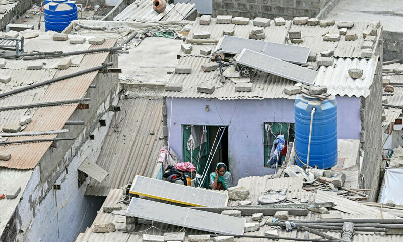 Solar panels are seen installed on rooftops in a slum in Karachi, on June 24, 2025. — AFP