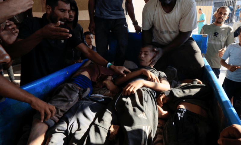  People react next to Palestinian casualties, who were seeking aid in Khan Younis, as they are brought into Nasser hospital following an incident, at Nasser hospital in Khan Younis in the southern Gaza Strip on July 16, 2025. &mdash; Reuters 