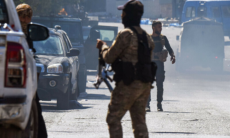 Syrian security forces deploy amid clashes in the southern city of Sweida, Syria on July 16. — AFP