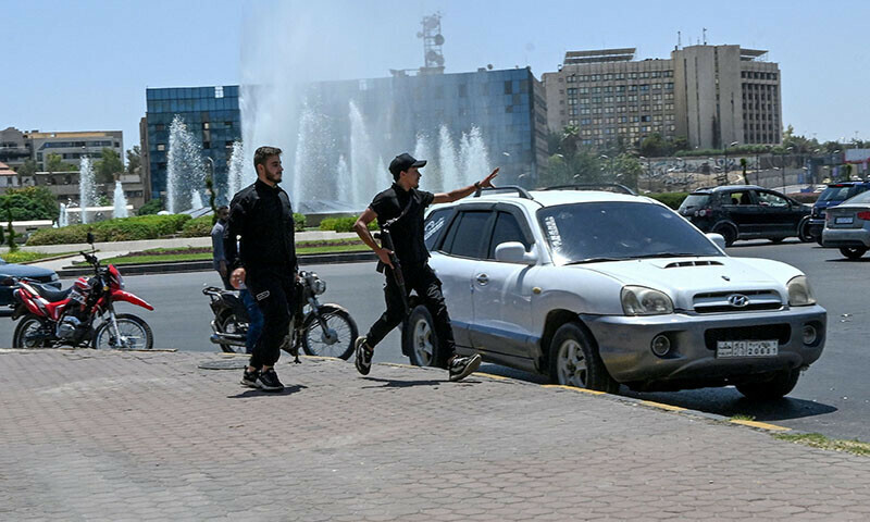 Syrian security forces deploy near the military headquarters in Damascus’ Ummayad Square, after Israel said it struck the site on July 16. — AFP
