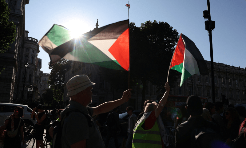People wave Palestinian flags during a protest after British lawmakers voted to ban pro-Palestinian campaign group Palestine Action as a terrorist organisation, outside Downing Street in London, Britain on July 2, 2025. — Reuters/File