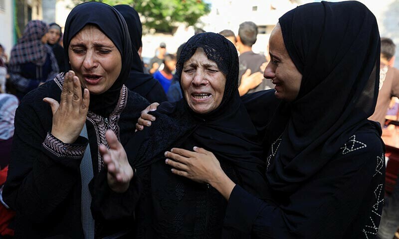 Mourners react during the funeral of Palestinians, including aid seekers, killed in Israeli attacks, according to medics, at Al-Shifa Hospital in Gaza City on July 22, 2025. &mdash; Reuters