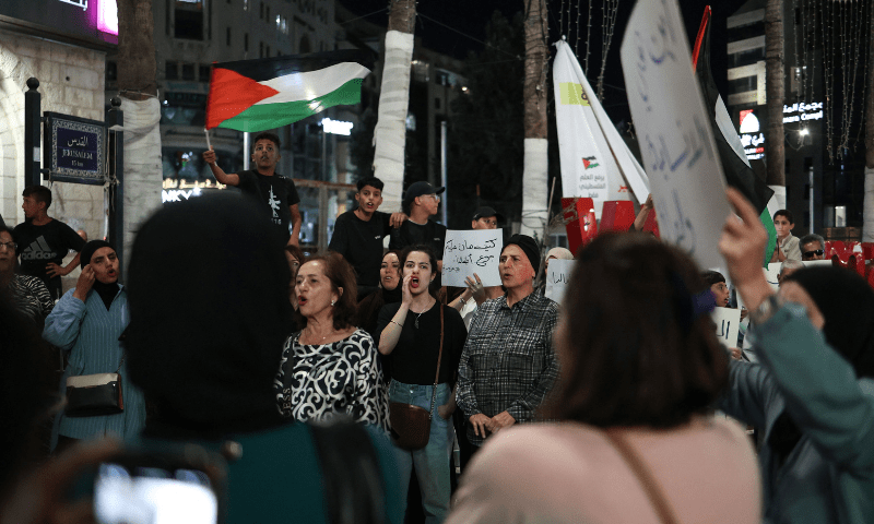  Palestinians chant slogans during a demonstration in support of Palestinians in Gaza facing severe shortages of food and other essentials in the city of Ramallah in the Israeli-occupied West Bank on July 23, 2025. &mdash; AFP 