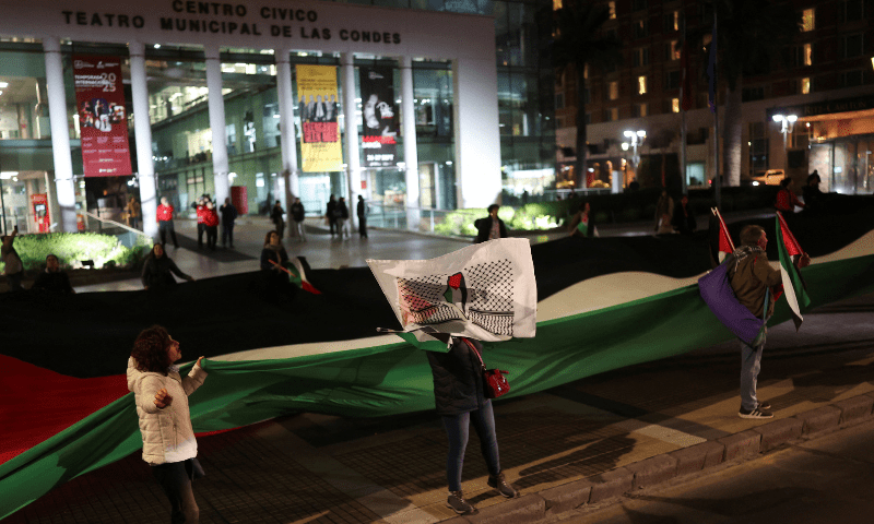  Demonstrators take part in a protest in solidarity with Palestinians in Gaza, in Santiago, Chile on July 25, 2025. &mdash; Reuters 