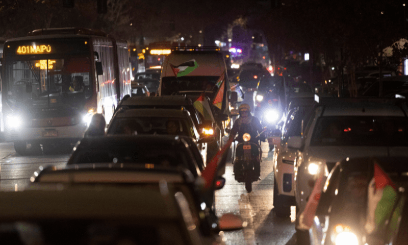  Protesters in a caravan of vehicles carry Palestinian flags during a protest in solidarity with Palestinians in Gaza, in Santiago, Chile on July 25, 2025. &mdash; Reuters 