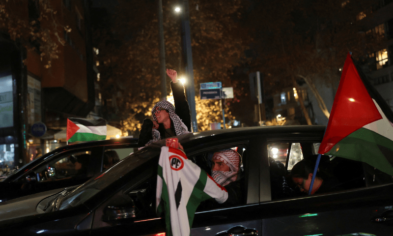 A woman in a car shouts slogans during a protest in solidarity with Palestinians in Gaza, in Santiago, Chile on July 25, 2025. &mdash; Reuters 