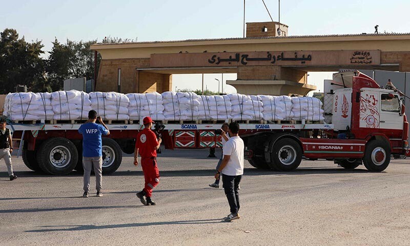A truck loaded with humanitarian aid awaits permission on the Egyptian side of the Rafah crossing with the Gaza Strip, to drive toward the besieged Palestinians territory on July 27, 2025. &mdash; AFP
