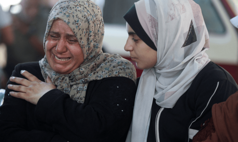  Mourners react during the funeral of Palestinians, who were killed by Israeli fire while trying to receive aid on Friday, according to medics, at Al-Shifa Hospital, in Gaza City, August 2, 2025. &mdash; Reuters 