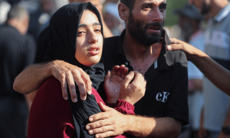  People mourn during the funeral of Palestinians, who were killed by Israeli fire while trying to receive aid on Friday, according to medics, at Al-Shifa Hospital, in Gaza City on August 2, 2025. &mdash; Reuters 