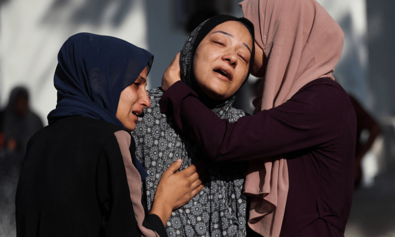  People mourn during the funeral of Palestinians, who were killed by Israeli fire while trying to receive aid on Friday, according to medics, at Al-Shifa Hospital, in Gaza City on August 2, 2025. &mdash; Reuters 