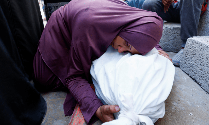  A woman reacts during the funeral of a Palestinian, who was killed by Israeli fire while trying to receive aid on Sunday, according to medics, at Al-Shifa Hospital, in Gaza City on August 4, 2025. &mdash; Reuters 