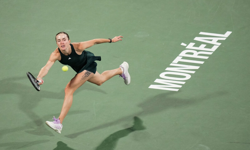  MONTREAL; Elina Svitolina of Ukraine hits a return against Japan’s Naomi Osaka during their Montreal Open quarter-final at the IGA Stadium.—Reuters 