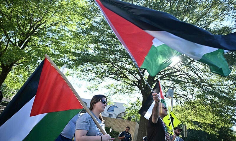 People participate in the &ldquo;Break the Siege on Gaza&rdquo; protest outside the Israeli Embassy in Washington, DC, on August 9, 2025. &mdash; AFP)