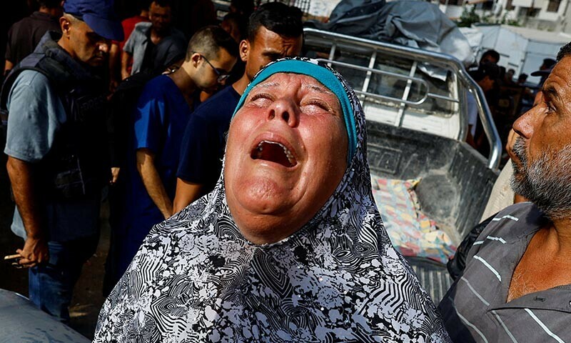 A mourner reacts during the funeral of Palestinians killed in Israeli fire while seeking aid on Friday, according to medics, at Al-Shifa Hospital, in Gaza City, August 16, 2025. — Reuters