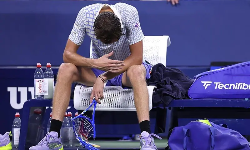 Daniil Medvedev breaks his racket after losing in five sets to Benjamin Bonzi of France during their Men’s Singles First Round match on Day One of the 2025 US Open at USTA Billie Jean King National Tennis Center on August 24, 2025 in the Flushing neighborhood of the Queens borough of New York City. — AFP