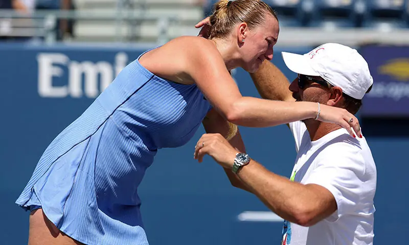 Petra Kvitova of the Czech Republic embraces her husband and coach Ji?&iacute; Van?k after her Women&rsquo;s Singles First Round match against Diane Parry of France for her final match before retiring on Day Two of the 2025 US Open at USTA Billie Jean King National Tennis Center on August 25, 2025 in the Flushing neighborhood of the Queens borough of New York City. &mdash; AFP