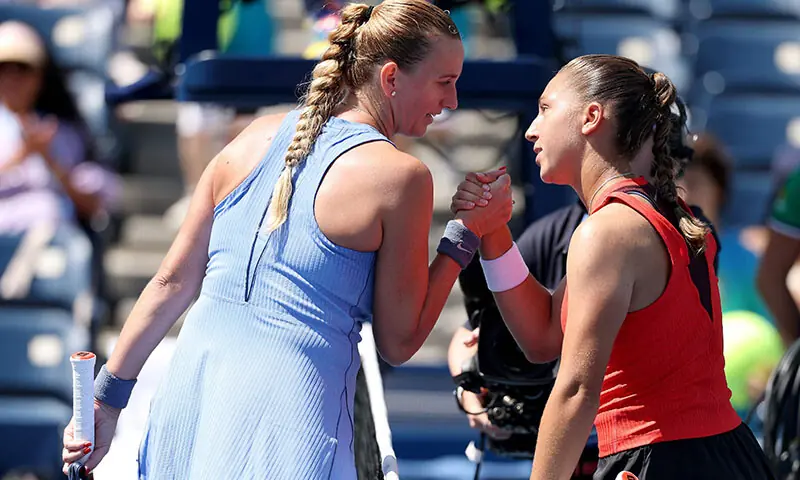 Petra Kvitova of the Czech Republic embraces Diane Parry of France after their Women&rsquo;s Singles First Round match on Day Two of the 2025 US Open at USTA Billie Jean King National Tennis Center on August 25, 2025 in the Flushing neighborhood of the Queens borough of New York City. &mdash; AFP