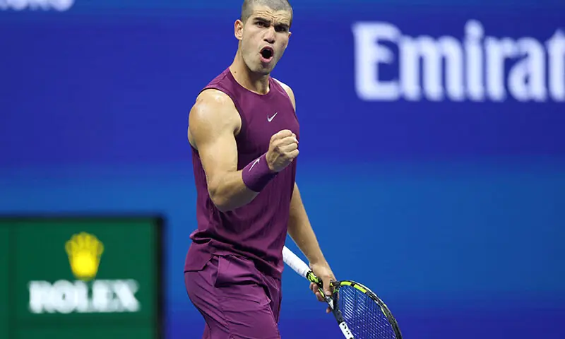 Carlos Alcaraz of Spain celebrates after winning the second set against Reilly Opelka of the United States during their Men&rsquo;s Singles First Round match on Day Two of the 2025 US Open at USTA Billie Jean King National Tennis Center on August 25, 2025 in the Flushing neighborhood of the Queens borough of New York City. &mdash; AFP