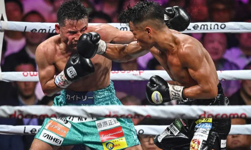 This file photo taken on September 3, 2024 shows the Japanese boxers Yoshiki Takei (R) and Daigo Higa in action. — AFP/File