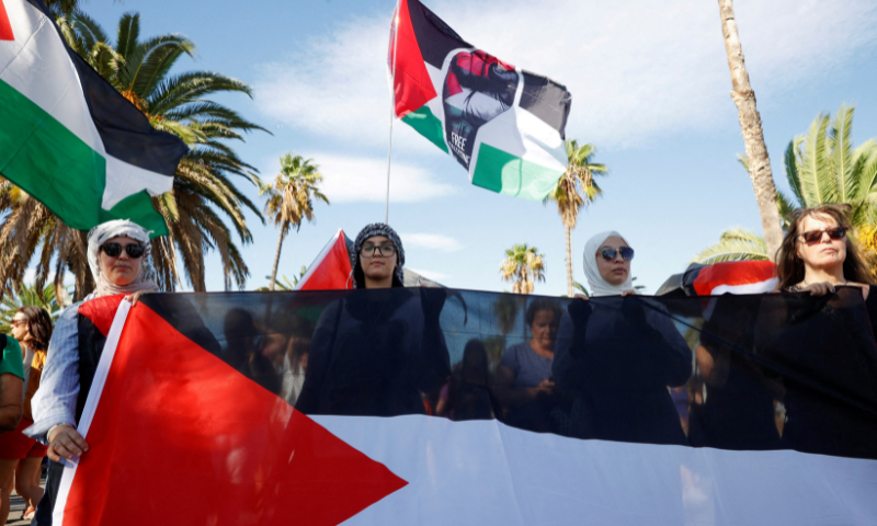 Activists gather at the launch of the Global Sumud humanitarian flotilla to Gaza, in the port of Barcelona, Spain, on August 29, 2025. &mdash; Reuters
