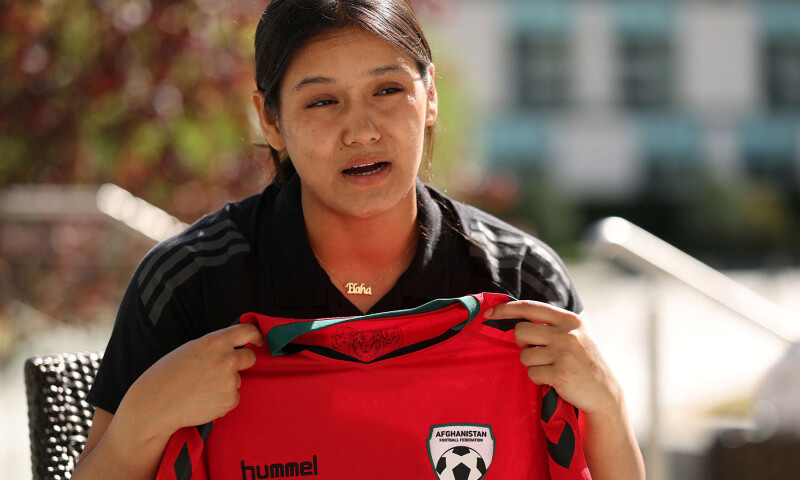 Elaha Safdari of the Afghan Women&rsquo;s Refugee holds her old national team shirt during an interview at a selection camp at St. George&rsquo;s Park, Burton upon Trent, Britain on August 26, 2025. &mdash; Reuters