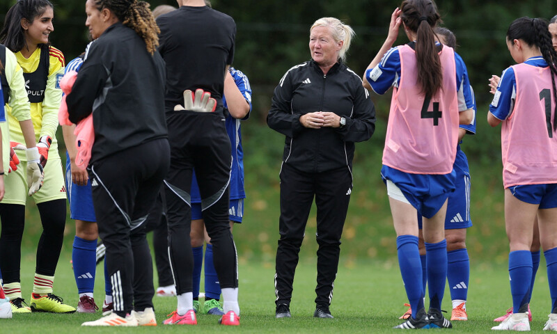 Head coach Pauline Hamill coaches the Afghan Women&rsquo;s refugee team during a selection camp at St. George&rsquo;s Park, Burton upon Trent, Britain on August 26, 2025. &mdash; Reuters