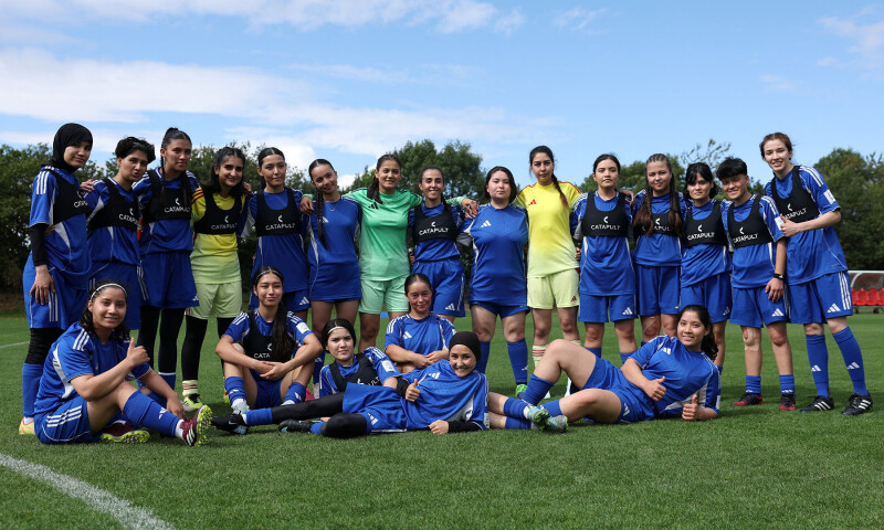 Members of the Afghan Women&rsquo;s Refugee team pose for a team group during a selection camp at St. George&rsquo;s Park, Burton upon Trent, Britain - August 26, 2025