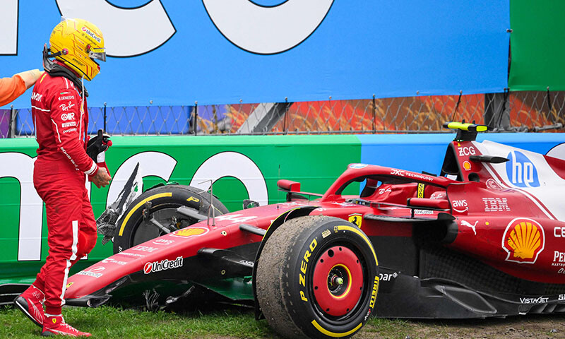 Ferrari’s British driver Lewis Hamilton looks at his car after crashing during the Formula One Dutch Grand Prix at The Circuit Zandvoort, western Netherlands, on August 31, 2025. — AFP