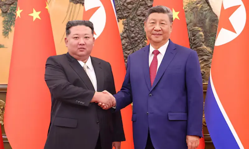 Chinese President Xi Jinping and Democratic People’s Republic of Korea (DPRK) leader Kim Jong Un shake hands at the Great Hall of the People in Beijing, China, on September 4, 2025. — <em>Reuters</em>