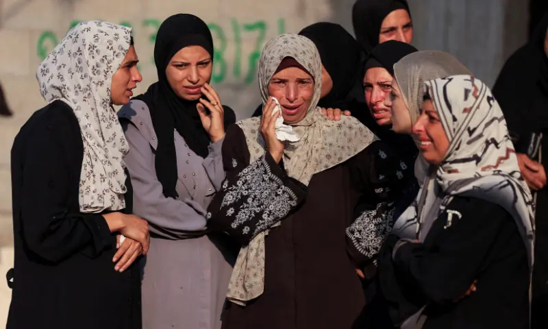 Mourners react during the funeral of Palestinians killed by Israeli fire while trying to receive aid on Friday, and others killed in overnight strikes, according to medics, at Al-Shifa Hospital in Gaza City, on September 6, 2025. &mdash; Reuters