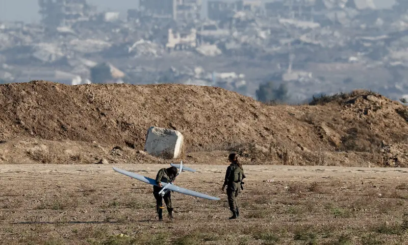 An Israeli soldier holds a drone before launching it near the border with Gaza, in Israel on September 17, 2025. — Reuters
