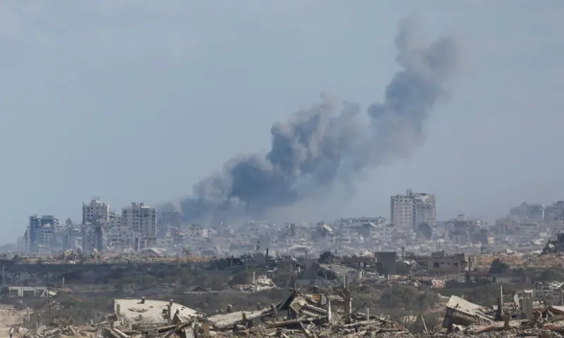 Smoke rises following an Israeli strike amid an Israeli operation, as seen from central Gaza Strip, on September 25. — Reuters