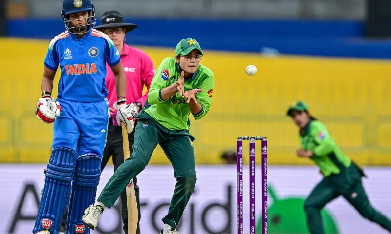 Pakistan’s Rameen Shamim (R) collects the ball as India’s Pratika Rawal watches during the ICC Women’s Cricket World Cup 2025 ODI match between India and Pakistan at the R. Premadasa International Cricket Stadium in Colombo on October 5, 2025. — AFP