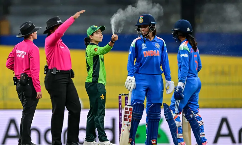 Pakistan’s captain Fatima Sana (C) sprays insect repellent in the air over the pitch during the ICC Women’s Cricket World Cup 2025 ODI match between India and Pakistan at the R. Premadasa International Cricket Stadium in Colombo on October 5, 2025. — AFP