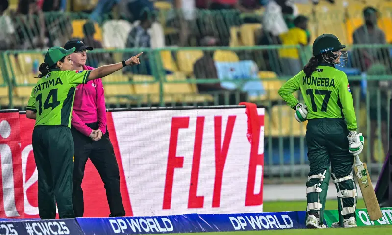 Pakistan’s captain Fatima Sana (L) speaks with umpire after the dismissal of Pakistan’s Muneeba Ali (R) during the ICC Women’s Cricket World Cup 2025 ODI match between India and Pakistan at the R. Premadasa International Cricket Stadium in Colombo on October 5, 2025. — AFP