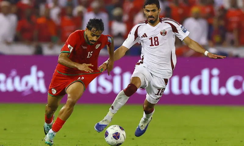 Oman&rsquo;s Nasser Al Rawahi in action with Qatar&rsquo;s Sultan Al-Brake at the Jassim Bin Hamad Stadium, in Doha, Qatar on October 8, 2025 . &mdash; Reuters