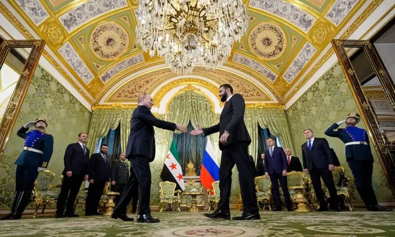 [2/4] Russia’s President Vladimir Putin shakes hands with Syria’s President Ahmed al-Sharaa during a meeting at the Kremlin in Moscow, Russia, October 15. — via Reuters