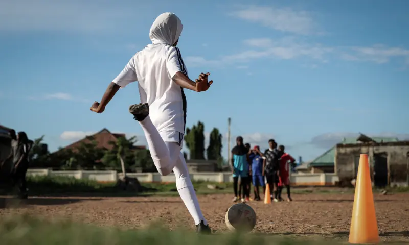 Maryam Muhammed, 17, a team member at the Model Queens Football Academy, prepares to kick a ball during a training session at an open pitch in Ilorin Central, Kwara State, Nigeria, September 25, 2025. — Reuters