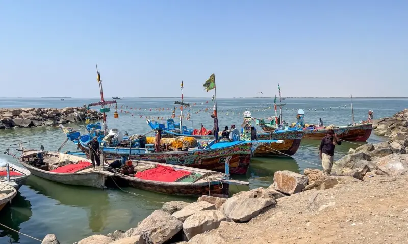 Fishers at the dock in Miani Hor. Local people know the lagoon has been made a marine protected area, but say they are unaware what that really means for them. &mdash;Hawwa Fazal