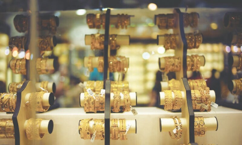Gold tumbles by record Rs14,000
