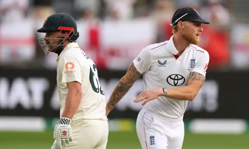 England’s Ben Stokes congratulates Australia’s Travis Head as he walks after losing his wicket off the bowling of Brydon Carse. — Reuters