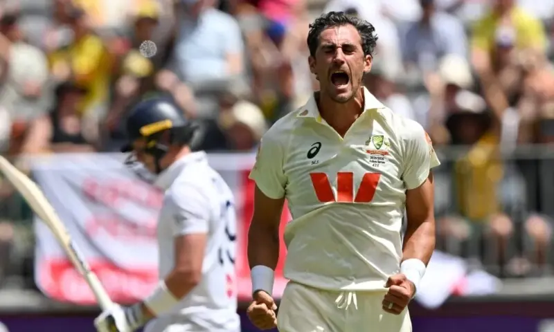 Australia’s Mitchell Starc celebrates his fifth wicket on day 1 of the first Ashes cricket. — AFP