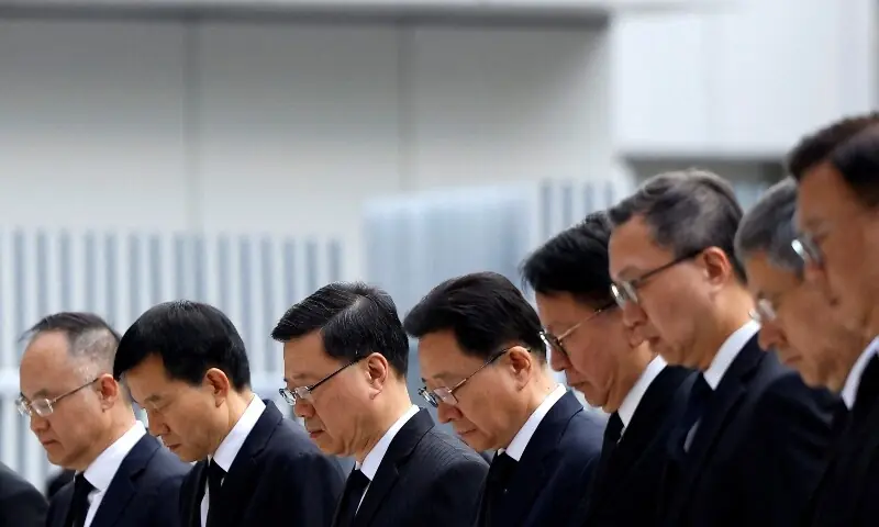 Hong Kong mourns victims of blaze that killed 128 and counting
