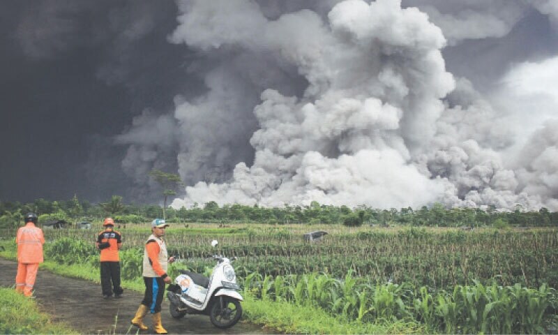 Volcano erupts near Bali, sending ash into the sky