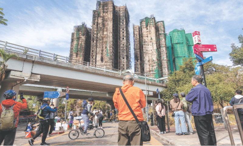 HK tower fire toll rises to 128, more arrests made