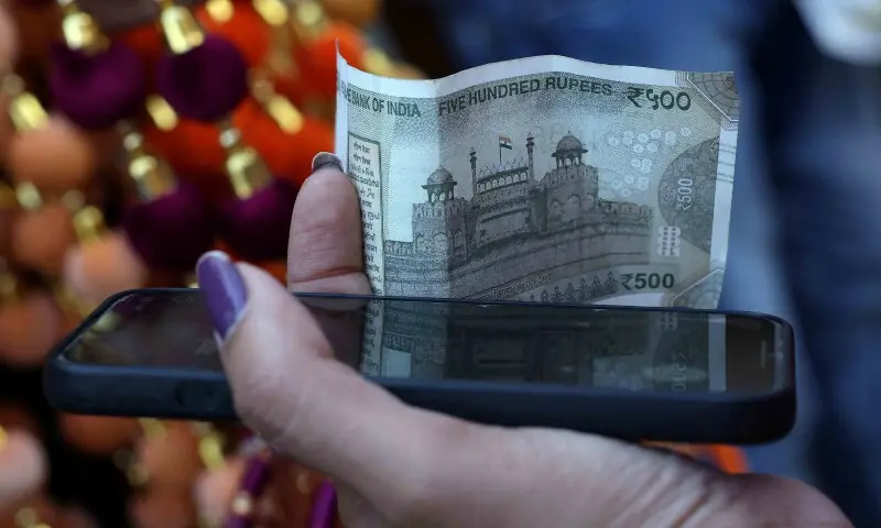 Indian rupee hits fresh record low past 90 per dollar